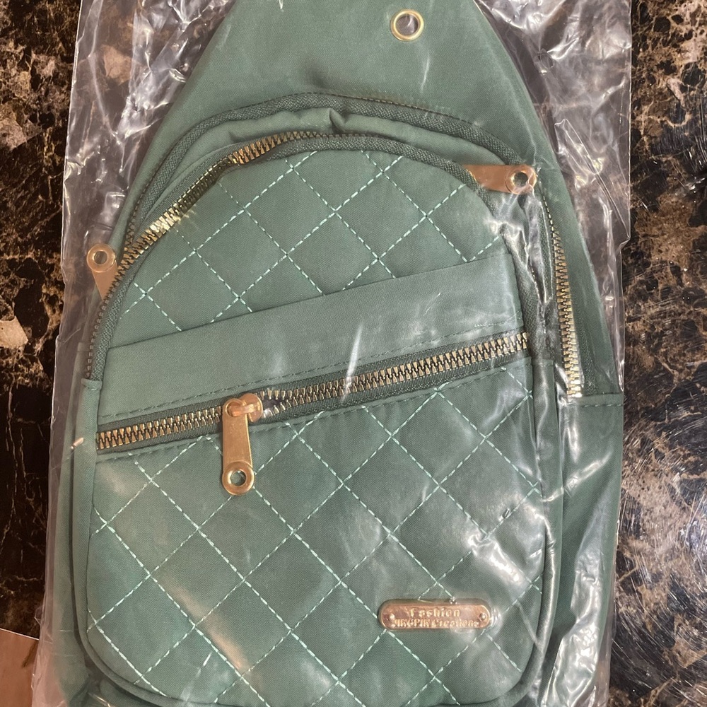 Green Quilted Backpack with Gold Accents